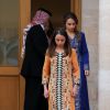 La princesse Salma et la princesse Iman de Jordanie, filles du roi Abdullah II et de la reine Rania, lors des célébrations de la Fête nationale jordanienne le 25 mai 2014, pour le 68e anniversaire de l'indépendance du royaume, au palais Raghadan à Amman.