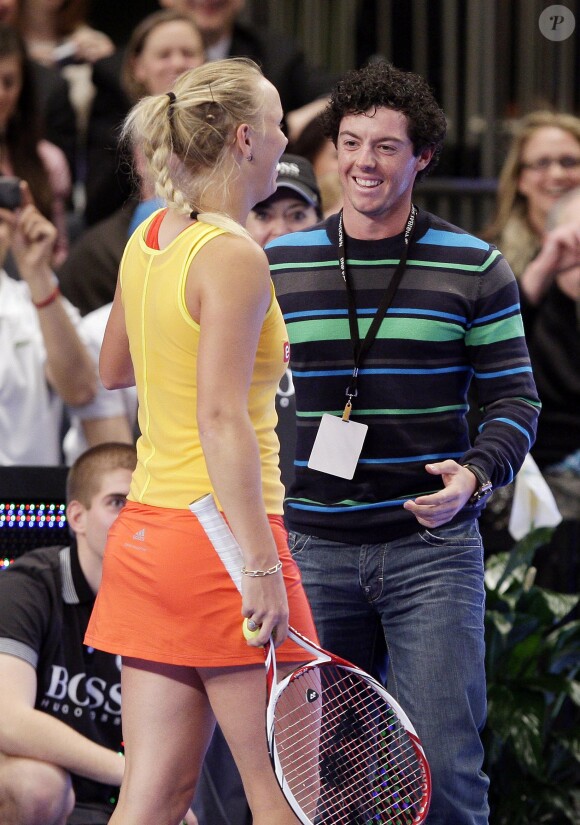 Rory McIlroy et Caroline Wozniacki lors d'un match exhibition durant le BNP Paribas Showdown au Madison Square Garden de New York le 5 mars 2012