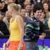 Rory McIlroy et Caroline Wozniacki lors d'un match exhibition durant le BNP Paribas Showdown au Madison Square Garden de New York le 5 mars 2012