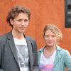 Mélanie Thierry et son compagnon le chanteur Raphaël - People au village des Internationaux de France de tennis de Roland Garros à Paris le 2 juin 2014.