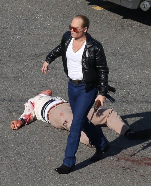Johnny Depp en action sur le tournage du film "Black Mass" près de Boston, le 2 juin 2014.