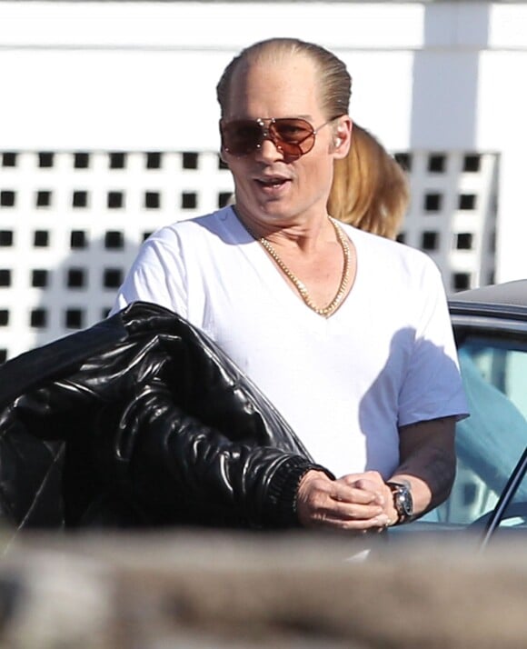 Johnny Depp détendu et métamorphosé sur le tournage du film "Black Mass" à Lynn, le 2 juin 2014.