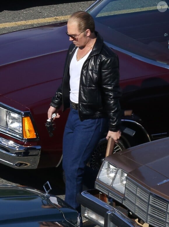 Johnny Depp en action sur le tournage du film "Black Mass" près de Boston, le 2 juin 2014.