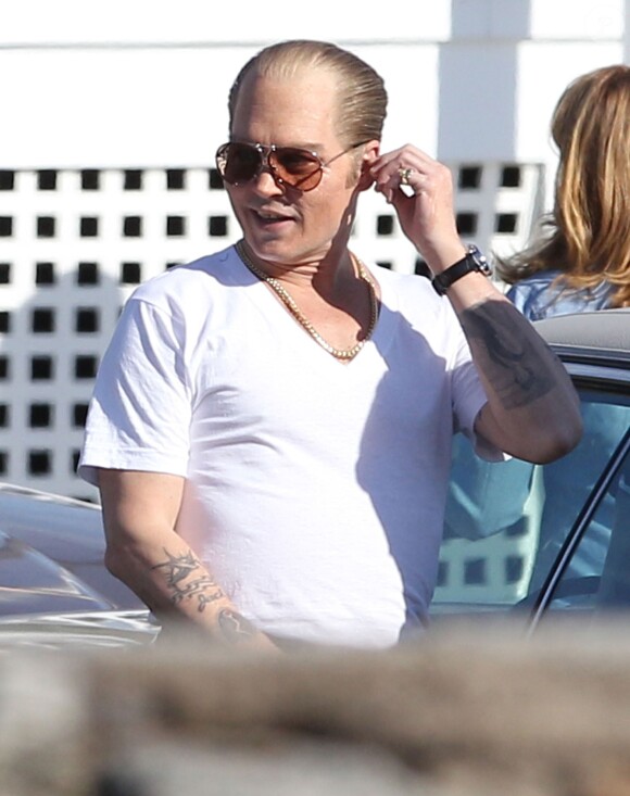 Johnny Depp détendu et métamorphosé sur le tournage du film "Black Mass" à Lynn, le 2 juin 2014.