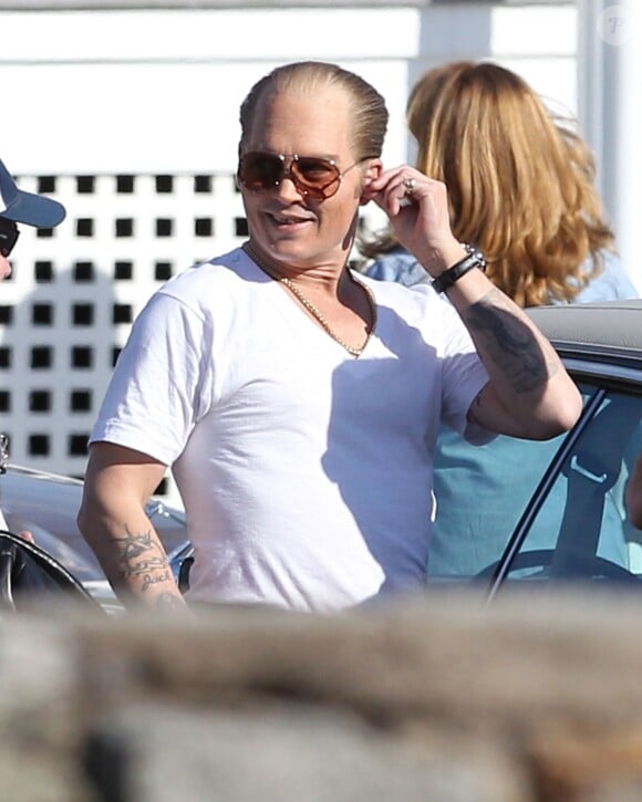 Johnny Depp détendu et métamorphosé sur le tournage du film "Black Mass" à Lynn, le 2 juin 2014.