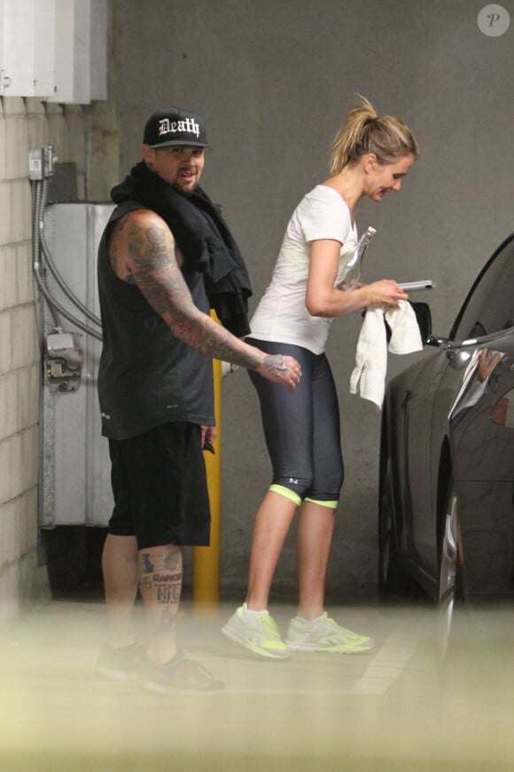Cameron Diaz sort d'une salle de gym en compangie de Benji Maden à Los Angeles, le 15 mai 2014.