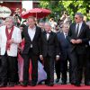 Jacques Herlin avec l'équipe du film Des Hommes et des Dieux au Festival de Cannes le 18 mai 2010.