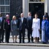 Le premier ministre britannique David Cameron reçoit Angelina Jolie, William Hague et les représentants du sommet sur les violences sexuelles lors de conflits, au 10 Downing Street à Londres, le 10 juin 2014.