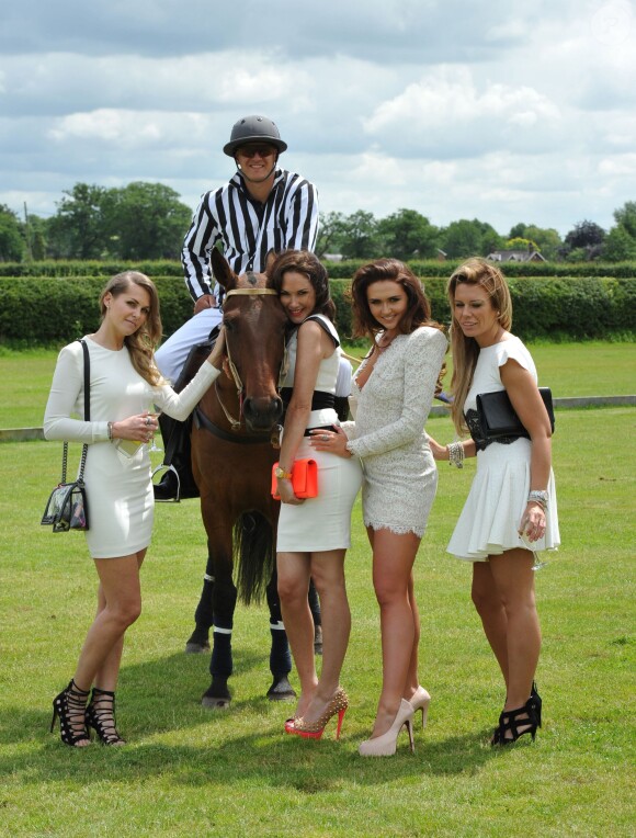 Jude Cissé lors d'un match de polo avec ses amies Claire Henry, Charlotte Dawson et Claire Ridley à Cheshire, le 11 juin 2014.