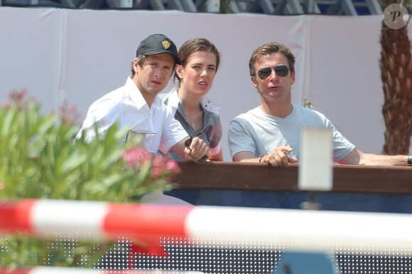 Guillaume Canet, Charlotte Casiraghi et Thierry Rozier lors du 2e jour du Jumping International de Cannes, le 13 Juin 2014 au Stade des Hespérides.