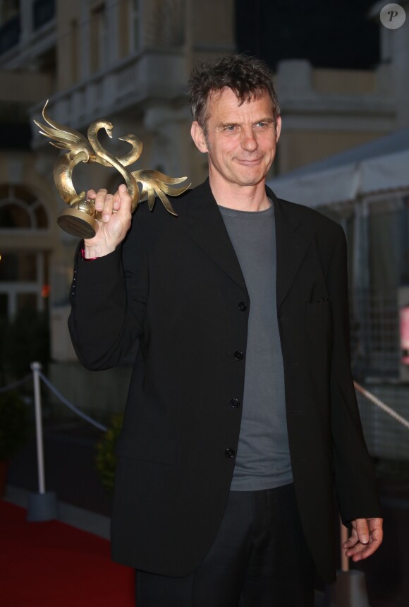 Lucas Belvaux (Swann d'or Meilleur film) lors de la cérémonie de clôture du Festival du film romantique de Cabourg, le 14 juin 2014.
