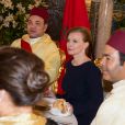  A la gauche de Valérie Trierweiler, lors d'un dîner d'Etat au palais royal à Rabat le 3 avril 2013, le prince Moulay Rachid, frère cadet du roi Mohammed VI du Maroc. 