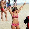 Karin Jimenez, épouse du footballeur colombien Santiago Arias, se prélasse au soleil en bikini rose, sur une plage de Rio de Janeiro. Le 16 juin 2014.