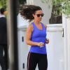 Exclusif - Pippa Middleton, en tenue de sport, récupère Lupo, le chien de sa grande soeur Kate. Londres, le 11 juin 2014.