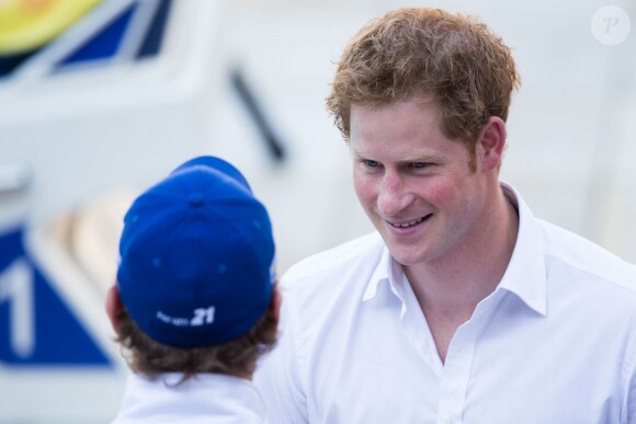Le prince Harry s'est rendu sur l'installation sportive Minas Tenis Clube à Belo Horizonte, au Brésil, le 24 juin 2014.