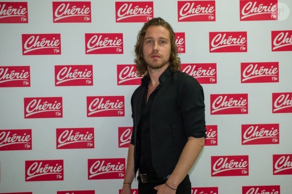 Julien Doré au photocall de son concert privée pour Chérie FM au Futuroscope de Poitiers, le 23 juin 2014.