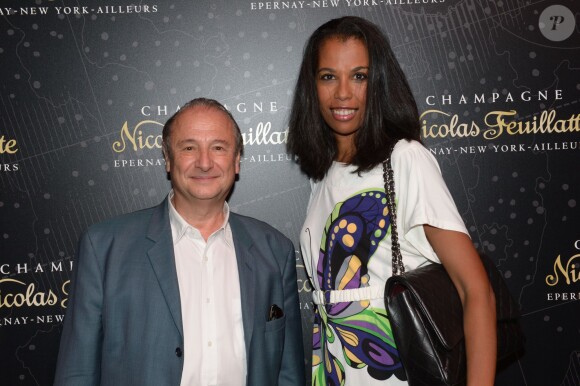 Exclusif - Patrick Braoudé et Elizabeth Tchoungui lors de la soirée Nicolas Feuillatte au Yoyo - Palais de Tokyo à Paris, le 26 juin 2014.