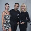 Candice Swanepoel, Riccardo Tisci et Amanda Lear - Défilé Givenchy homme collection printemps-été 2015 à la Halle Freyssinet à Paris, le 27 juin 2014.