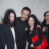 Riccardo Tisci, Katia et Marielle Labèque - Défilé Givenchy homme collection printemps-été 2015 à la Halle Freyssinet à Paris, le 27 juin 2014.