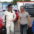 Exclusif - Cyril Viguier rencontre François Fillon au Mans, le 4 juillet 2014, sur le circuit des 24 Heures du Mans à l'occasion du Mans Classic.