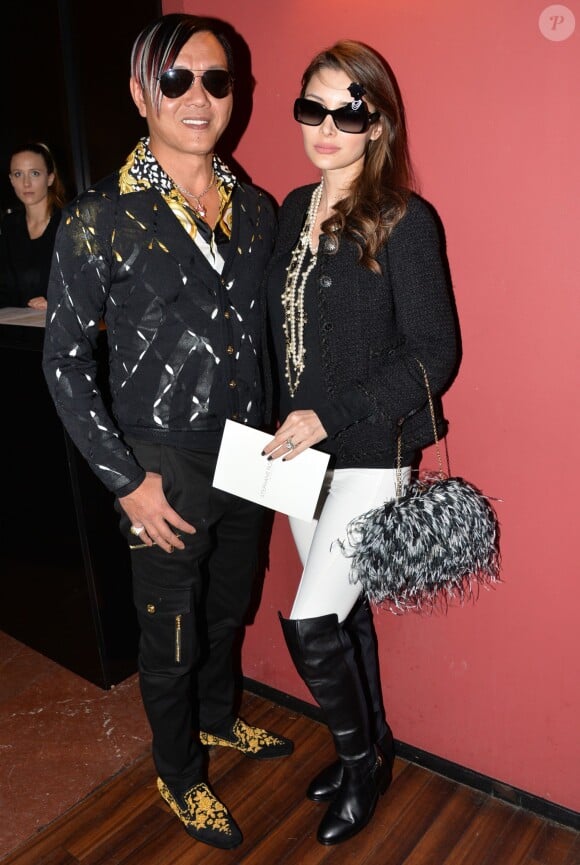 Stephen Hung et sa femme Deborah Valdez-Hung au défilé de mode Stéphane Rolland lors de la Fashion Week Haute Couture Automne-Hiver 2014/2015 au Cinéma Elysées Biarritz à Paris, le 8 juillet 2014.