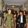 Kim Kardashian, Olivier Rousteing, Kendall Jenner, Binx Walton, Kayla Scott, Issa Lish et Amanda Wellsh quittent l'atelier Balmain (44, rue François 1er) pour se rendre au gala de la Vogue Paris Foundation, au Palais Galliera. Paris, le 9 juillet 2014.