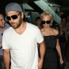 Pamela Anderson et Rick Salomon à l'aéroport de Nice pour le Festival de Cannes, le 13 mai 2014.