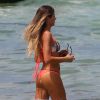 La surfeuse Anastasia Ashley passe ses vacances avec des amis à Miami le 18 juillet 2014