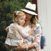 Jessica Alba, son mari Cash Warren et leurs filles Honor et Haven se rendent à une fête à Los Angeles. Le 19 juillet 2014