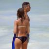 Jessica Alba profite d'une belle journée ensoleillée à la plage avec son mari Cash Warren et sa fille Honor à Mexico, le 10 juillet 2014 
Photo exclusive