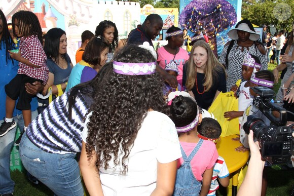 Chelsea Clinton, enceinte, à l'événement Pirate and Princess: Power of Doing Good organisé par la chaîne Disney Junior dans le quartier d'Harlem à New York, le 25 juillet 2014. La fille de Bill Clinton s'est adressée à des enfants de 2 à 7 ans et leur famille pour leur rappeller l'importance de s'investir pour faire le bien autour de soi.