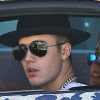 Exclusif - Justin Bieber se promène dans les rues de Los Angeles dans une Audi R8 au motif panthère. Le 9 juillet 2014.