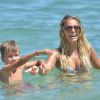 Exclusif - Sylvie Meis (ex-Van der Vaart) et son fils Damian Rafael se baignent à la plage. Saint-Tropez, le 30 juillet 2014.