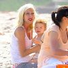 Tori Spelling à la plage en famille à Malibu, le 30 juillet 2014.