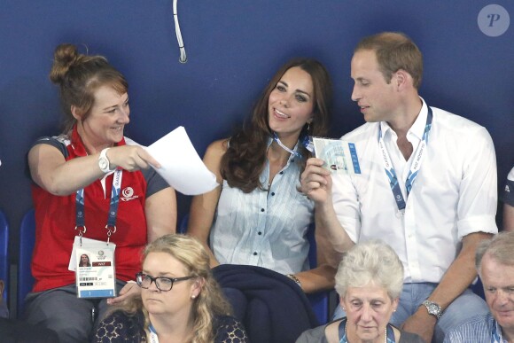 Kate Middleton avec le prince William au Tollcross Swimming Centre le 28 juillet 2014 à Glasgow lors des XXe Jeux du Commonwealth