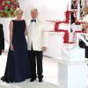Charlene de Monaco, enceinte, et son époux le prince Albert II lors du 66e Gala de la Croix Rouge au Sporting de Monte-Carlo le 1er août 2014