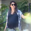 Exclusif - Mila Kunis enceinte fait du shopping à Hollywood, le 5 août 2014.