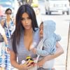 Kim Kardashian et sa fille North West arrivent à l'appartement de Kanye West, à SoHo. New York, le 11 août 2014.