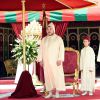 Le roi Mohammed VI du Maroc avec son fils et son frère lors de la Fête du Trône le 30 juillet 2014 à Rabat