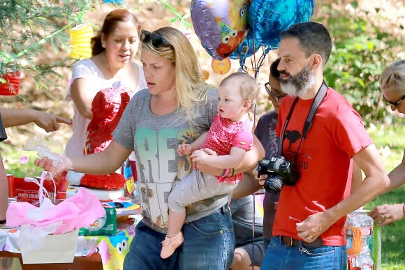 Busy Philipps et son mari Marc Silverstein ont organisé une fête pour le premier anniversaire de leur fille Cricket à Los Angeles, le 3 juillet 2014.