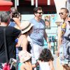 Exclusif - Laurent Gerra et sa compagne Christelle Lyon se promènent dans les rues de Saint-Tropez le 7 août 2014.