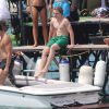Lourdes Leon et son frère Rocco Ritchie, les enfants de Madonna, se baignent à Cannes, le 6 août 2014. 