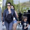 Kim Kardashian et son neveu Mason Disick quittent le cinéma après avoir regardé Teenage Mutant Ninja Turtles. Calabasas, le 19 août 2014.