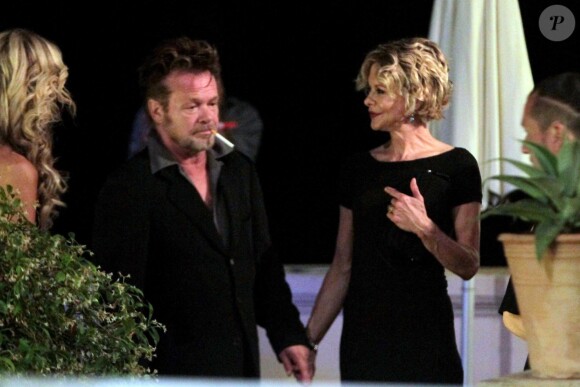 Meg Ryan et John Mellencamp lors du 59e Festival de Taormina, en juin 2013. L'actrice et le rockeur, en couple depuis fin 2010, se sont séparés en 2014.
