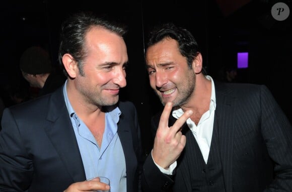 Jean Dujardin et Gilles Lellouche à Paris le 17 février 2012.