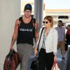 Kate Mara et Johnny Wujek arrivent à l'aéroport LAX de Los Angeles pour prendre un avion, le 26 août 2014.