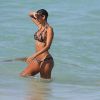 Nicole Murphy profite d'une journée ensoleillée sur une plage de Miami. Le 1er septembre 2014.