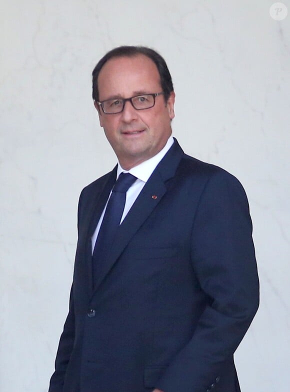 François Hollande quitte le conseil des ministres au Palais de l'Elysée, à Paris, le 3 septembre 2014.