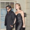 Johnny Depp et Amber Heard quittent les GQ awards à Londres le 3 septembre 2014.