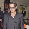Johnny Depp quitte les GQ awards à Londres le 3 septembre 2014.